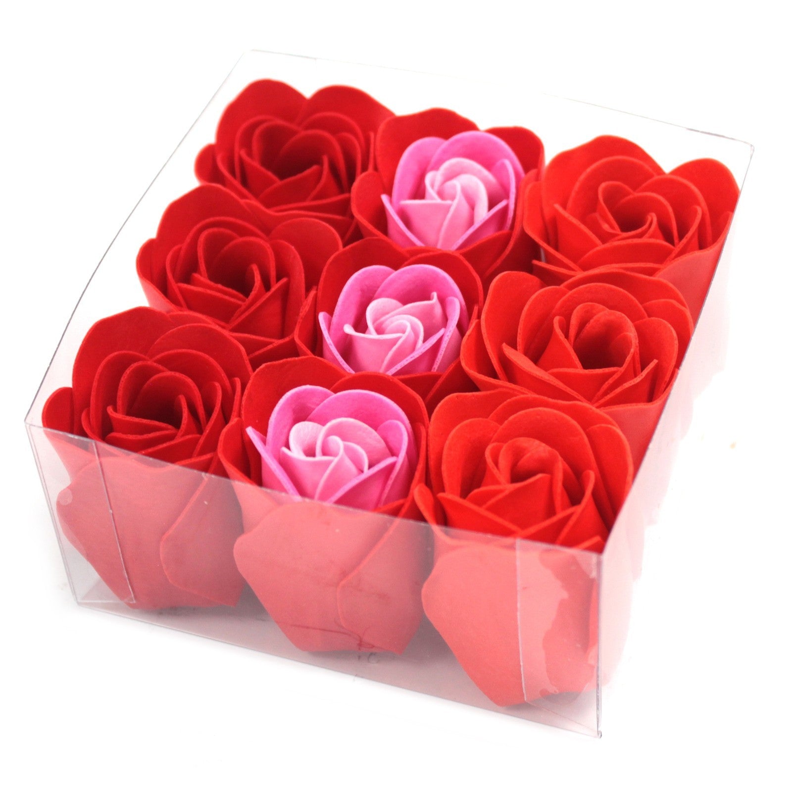 Boite de 9 rose de savon de différentes nuance de rouges. 3 roses tricolores.