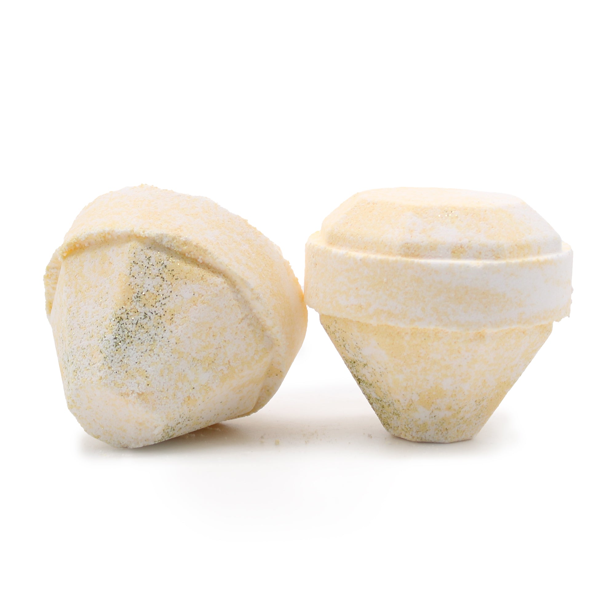 Bombe de bain Blanc et Or avec une gemme qui se découvrira lors du bain