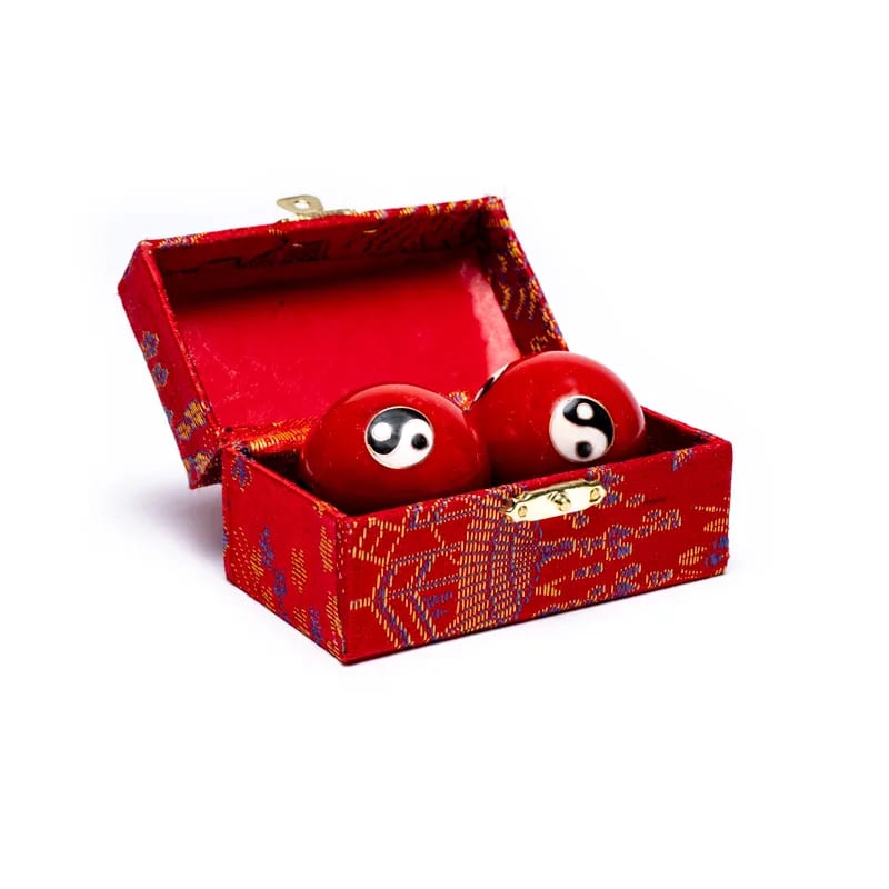 Boules de santé Qi Gong Yin et Yang rouges de 4 cm présentées dans leur coffret cadeau