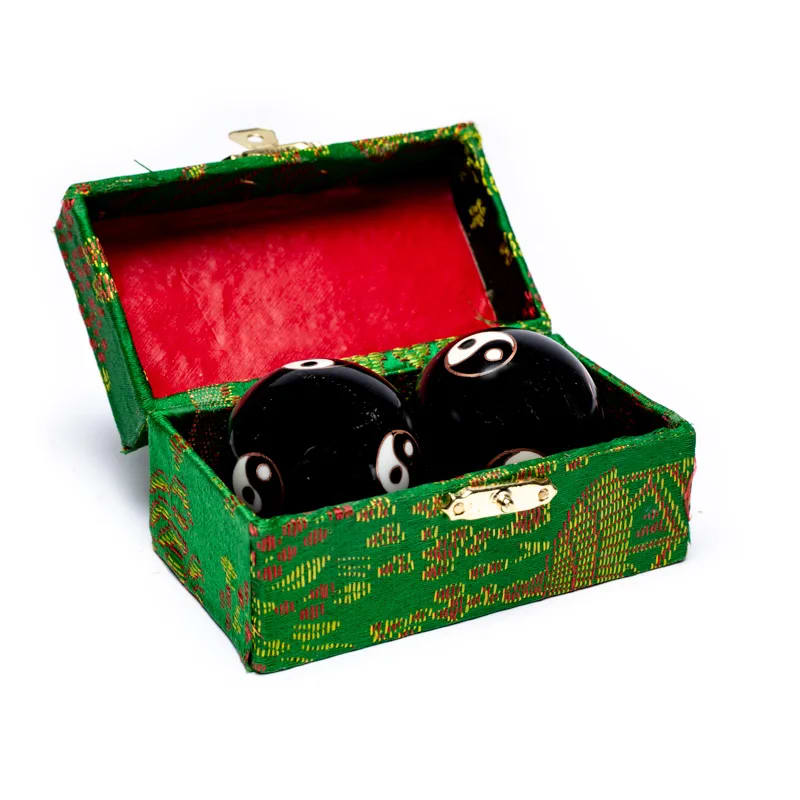 Boules Qi Gong Yin Yang noires présentées en coffret cadeau