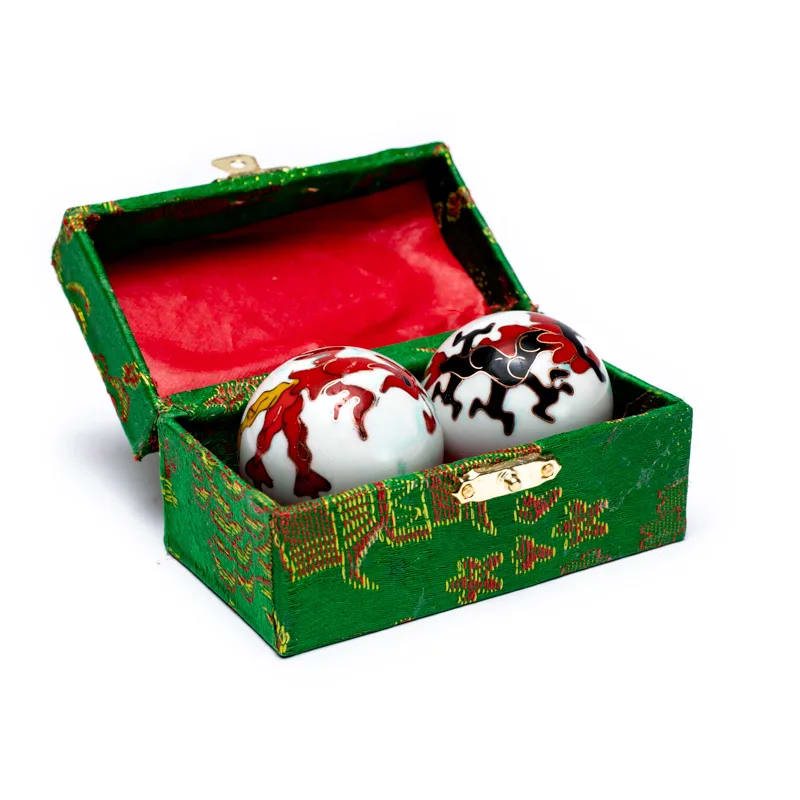 Boules de santé Qi Gong Phénix et Dragon de 4 cm présentées dans leur coffret décoratif traditionnel