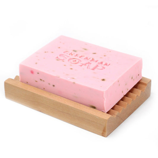 Savon Greenman -Deluxe sur un porte savon. Senteurs Bois de rose et Ylang