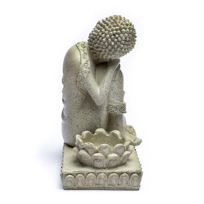 Bouddha gris avec bougeoir