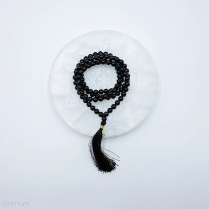 Mala Tourmaline Noire | 8mm sur une pierre de chargement en sélénite