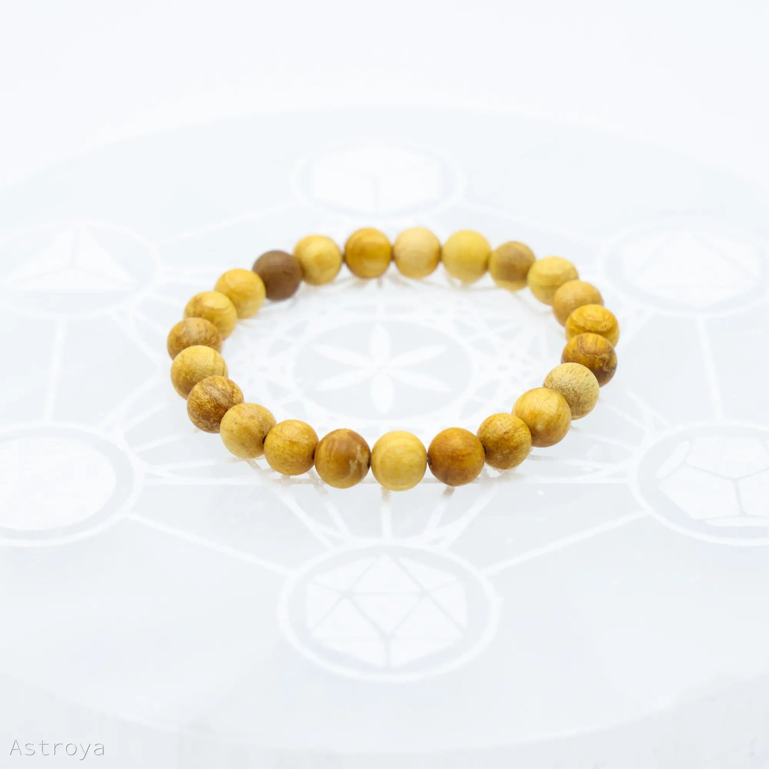 Protection et prospérité avec ce Bracelet Palo Santo perles rondes - 8 mm
