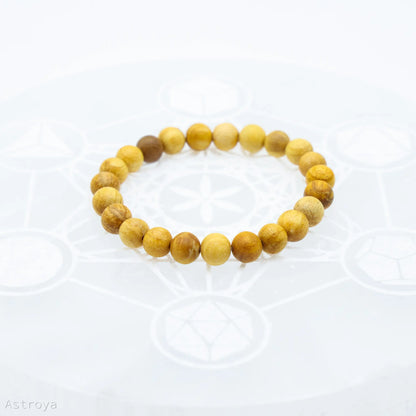 Protection et prospérité avec ce Bracelet Palo Santo perles rondes - 8 mm
