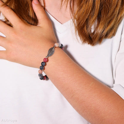 Bracelet Rhodonite - Quartz Gris avec Plume