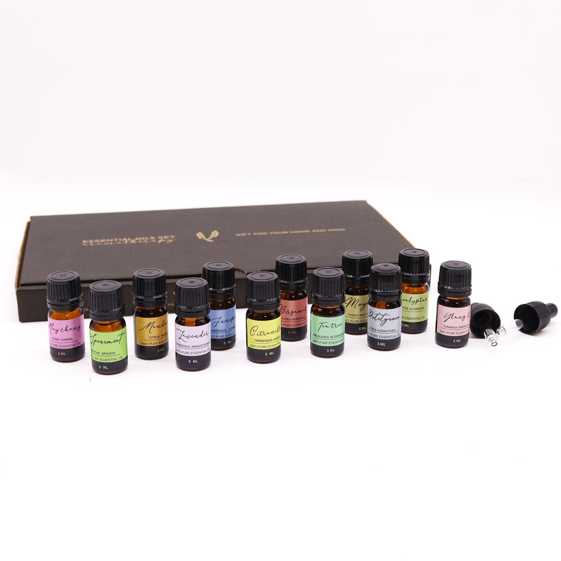 Assortiment d’huiles essentielles printanières pour diffusion et relaxatio