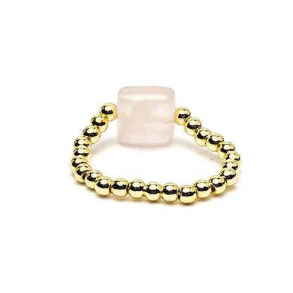 Bague élastique perles quartz rose taillées à facettes accessoire tendance et zen