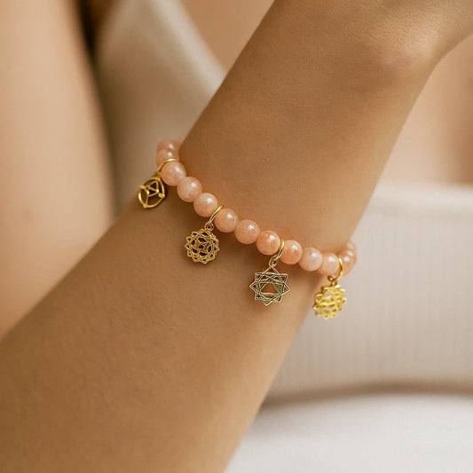 Bracelet à breloques avec symboles des chakras Pierre de soleil