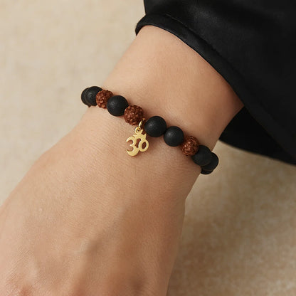 Bracelet Rudraksha - Pierre de lave | charm Om