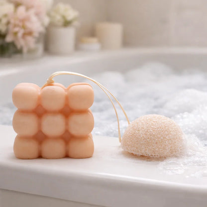 Savon de massage aromathérapie au géranium et bois de santal, accessoire bien-être pour un massage relaxant et sensoriel sous la douche ou au bain